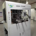 Volautomatische haakwikkel- en tapmachine